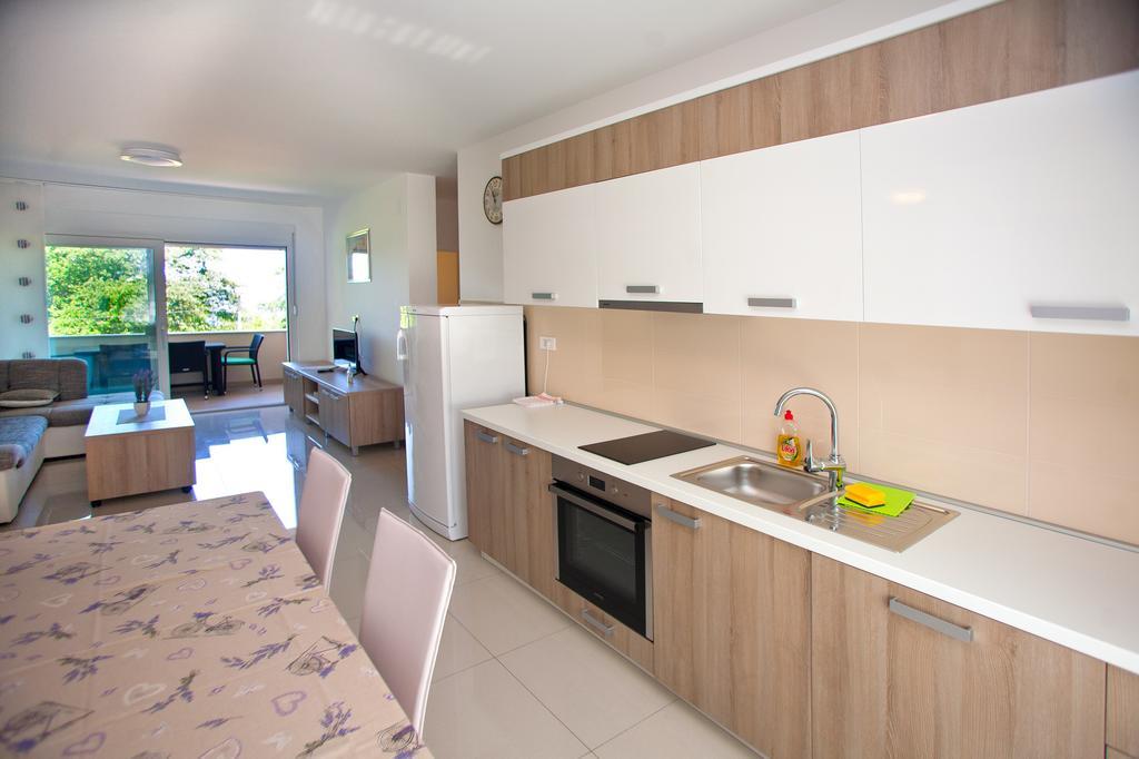 Apartments Maslina I Njivice Pokoj fotografie